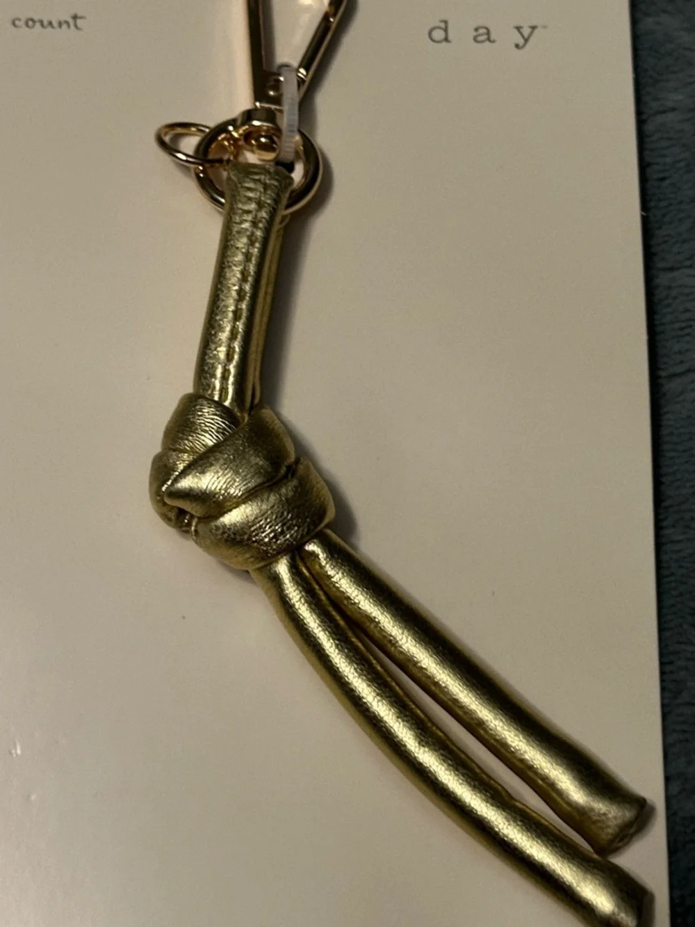 a new day Gold Knot Tassel Keychain